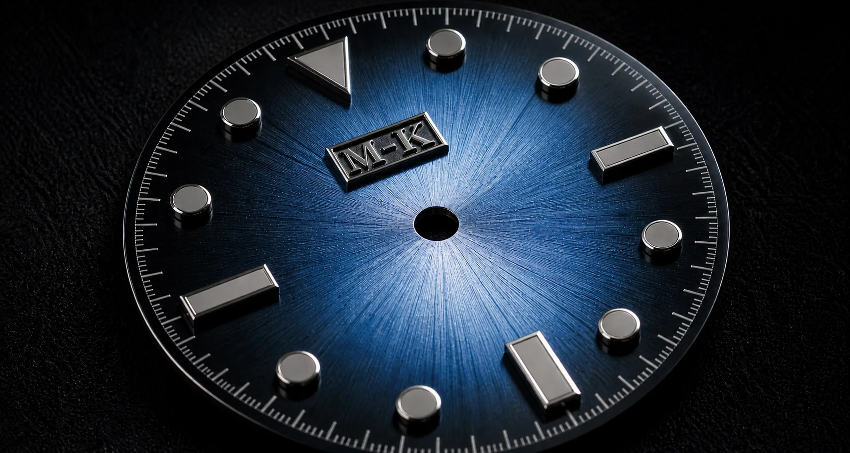 Blue finished dial detail showing applied markers