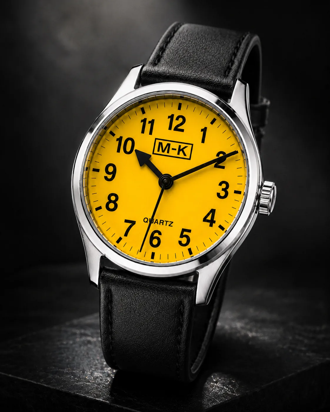 Close production shot of the yellow dial M-K watch